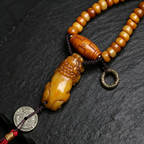 108-Piece Vintage Bone Flat Round Bead Long Necklace with Hand Carved Figurine Pendant & Handwoven