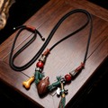 Plateau Folk Hand Woven Cord Pendant Necklace with Carved Nut & Metal Alloy Decor | Ethnic Retro Adjustable Lariat Necklace for Somatic Calming & Karmic Realignment