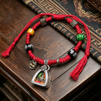 Artisanal Handwoven Red Braided Bracelet, Himalayan Traditional Metal Pendant