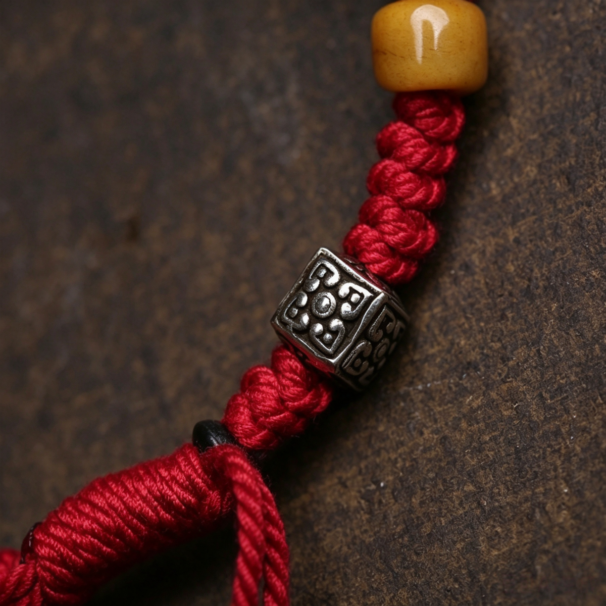 Artisanal Handwoven Red Braided Bracelet, Himalayan Traditional Metal Pendant